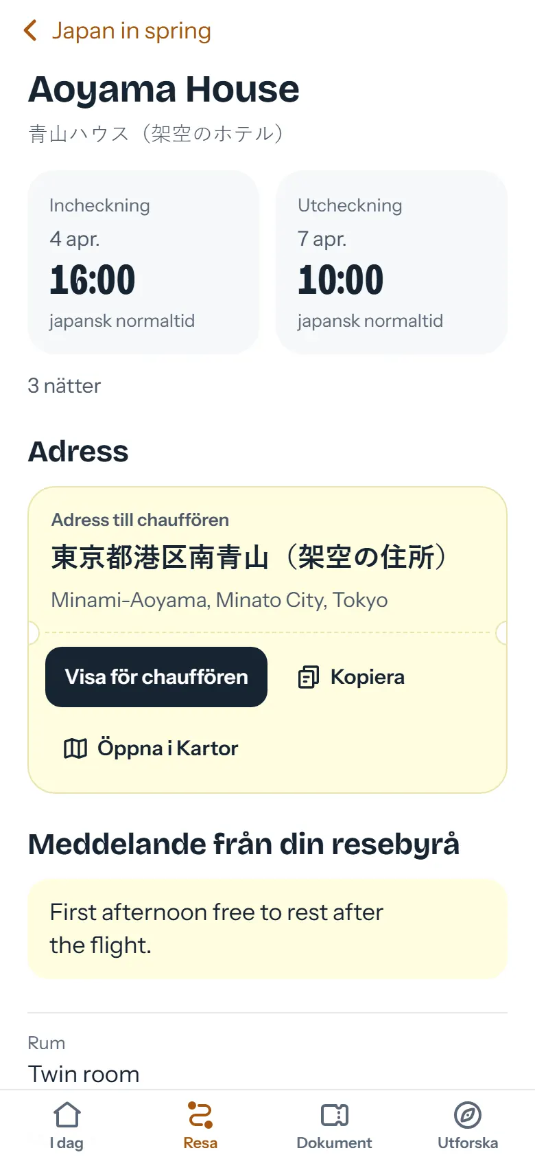 Hotellsidan med adressen på japanska och knappen Visa för chauffören
