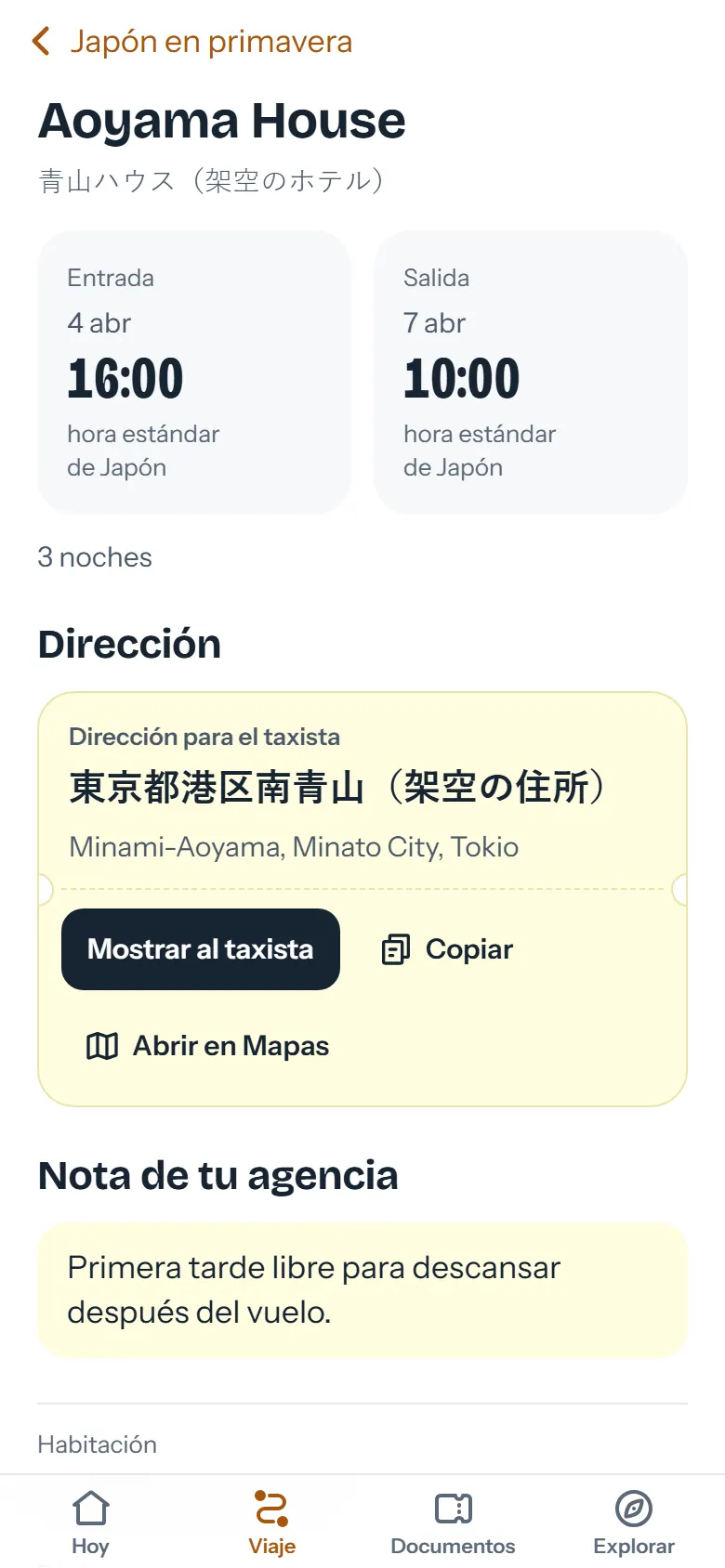 Ficha del hotel con la dirección en japonés y el botón Mostrar al taxista