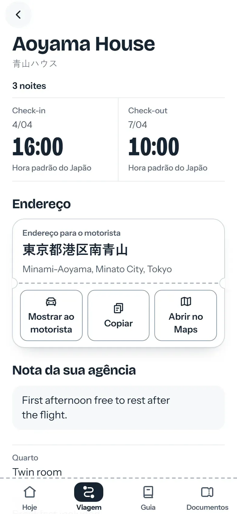 Página do hotel no app do viajante com o endereço em japonês e o botão Mostrar ao motorista
