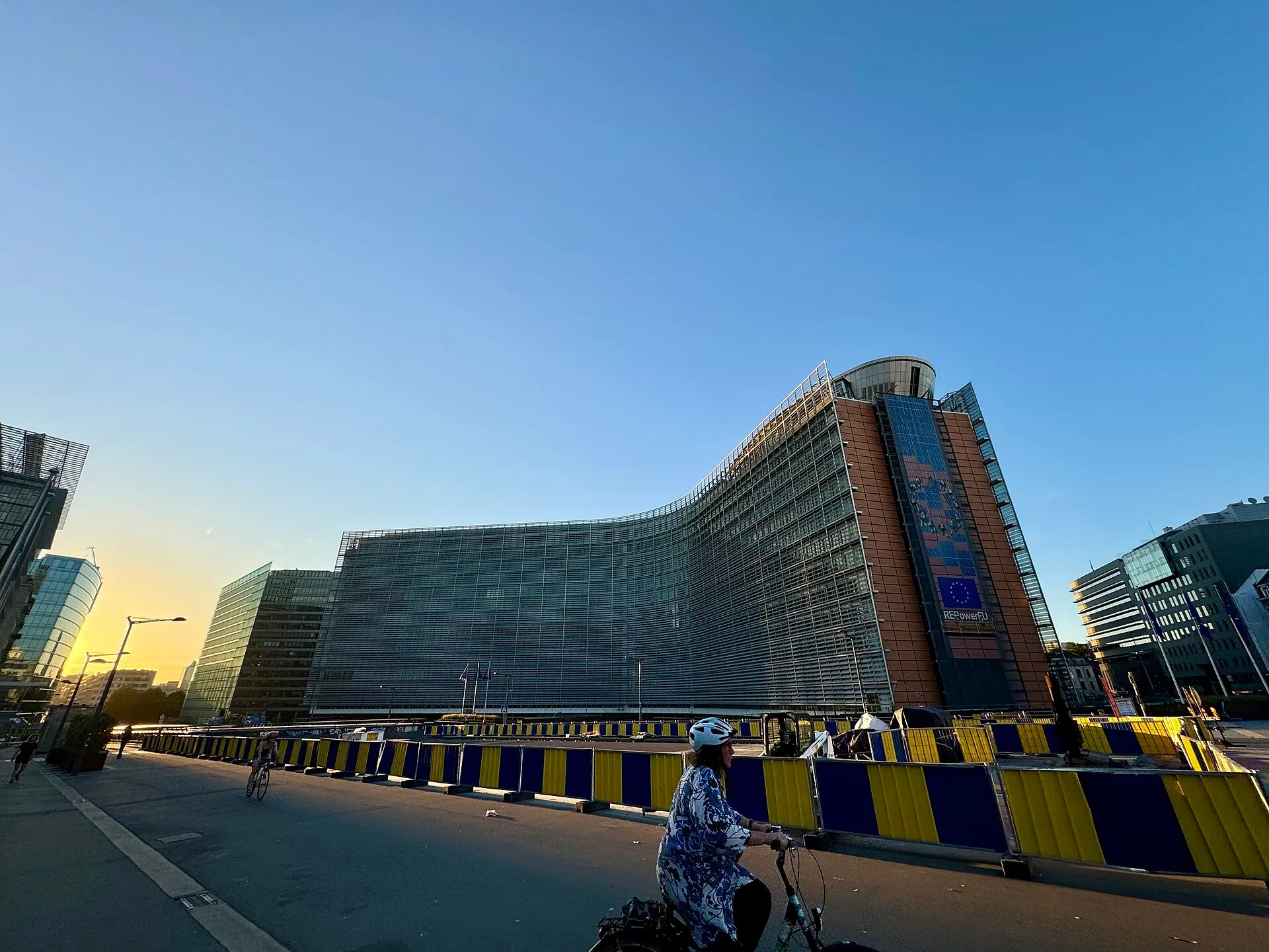 EU flags in front of the Berlaymont building, headquarters of the European Commission in Brussels