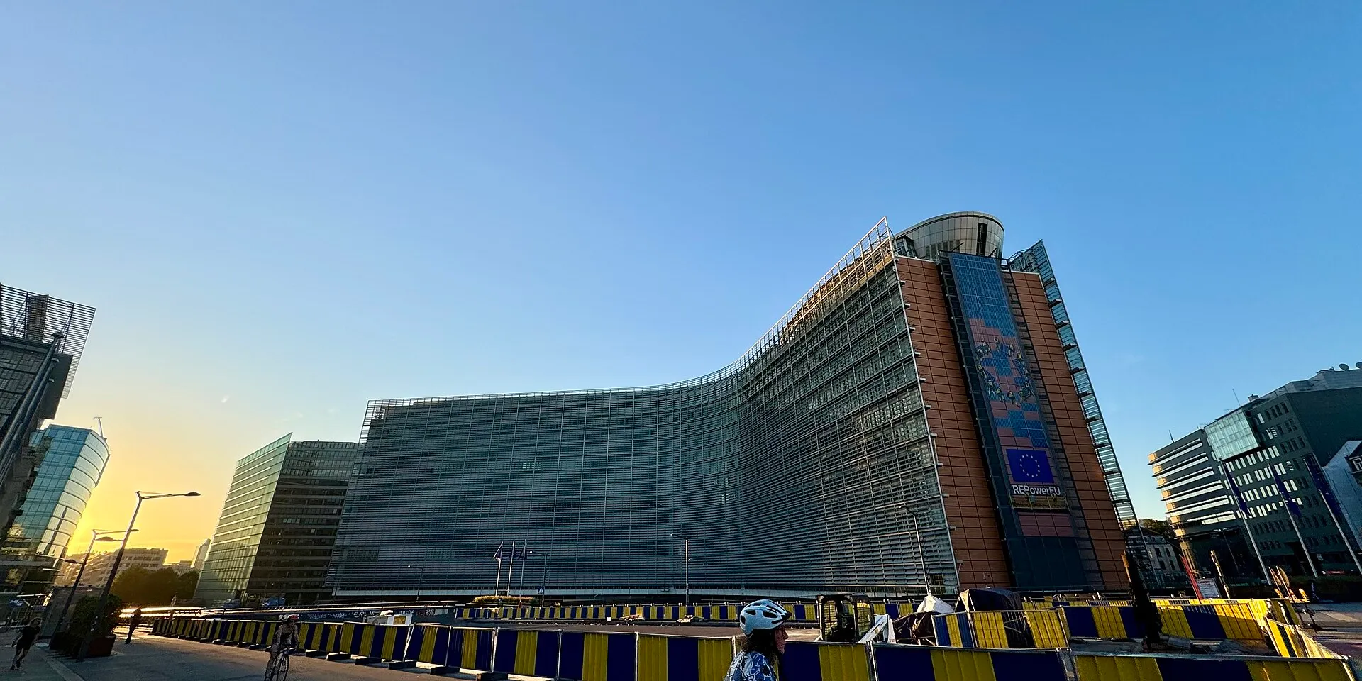 EU flags in front of the Berlaymont building, headquarters of the European Commission in Brussels
